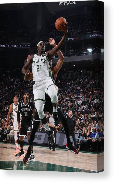 Nba Pro Basketball Canvas Print featuring the photograph Jrue Holiday by Nathaniel S. Butler