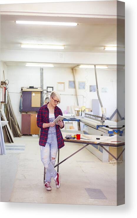 Working Canvas Print featuring the photograph Modern Female Carpenter #3 by Daniela Jovanovska-Hristovska