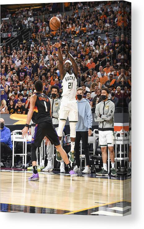Jrue Holiday Canvas Print featuring the photograph Jrue Holiday by Andrew D. Bernstein