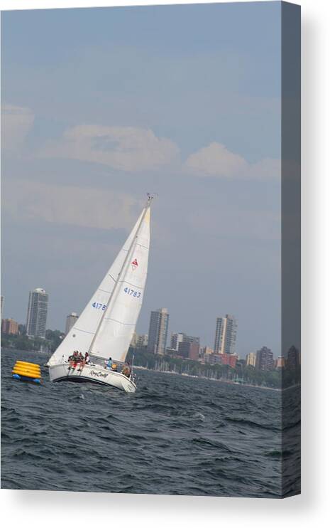  Canvas Print featuring the photograph The race #74 by Jean Wolfrum