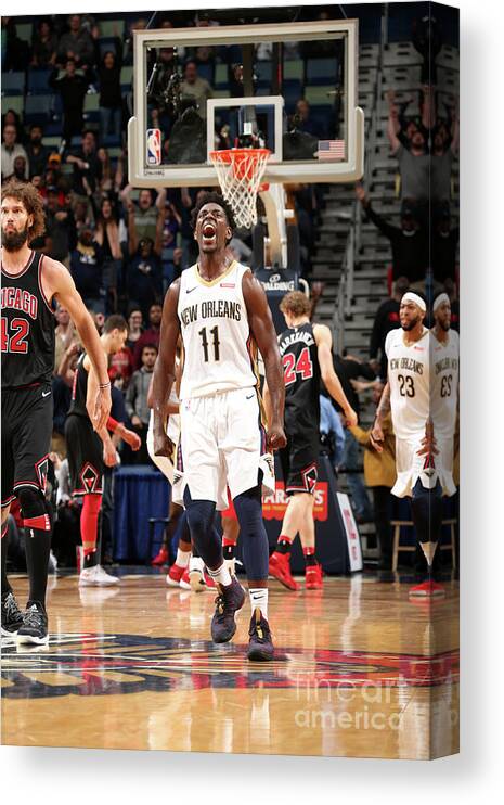 Smoothie King Center Canvas Print featuring the photograph Jrue Holiday by Layne Murdoch