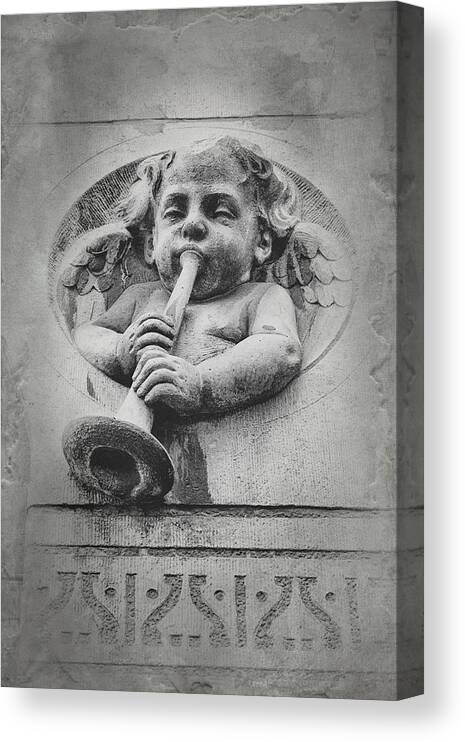 Angel Canvas Print featuring the photograph A Winged Cherub in Amsterdam by Mary Lee Dereske