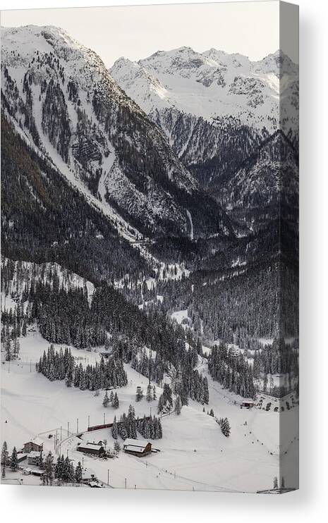 Tranquility Canvas Print featuring the photograph Albula Railway in winter landscape by Merten Snijders