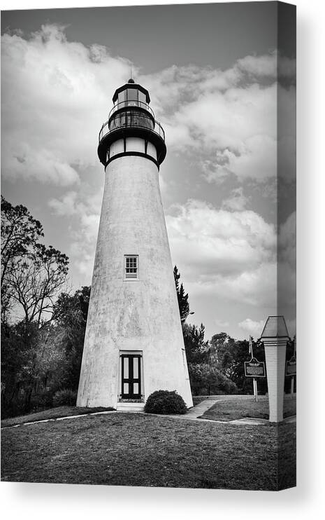 Clouds Canvas Print featuring the photograph Amelia Island Lighthouse in the Clouds in Black and White by Debra and Dave Vanderlaan