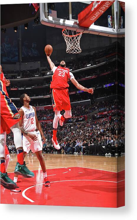 Anthony Davis Canvas Print featuring the photograph Anthony Davis and Rajon Rondo by Andrew D. Bernstein