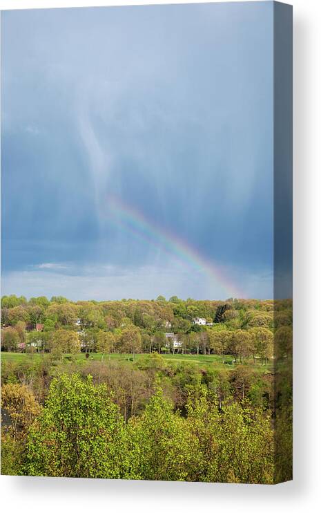 Rain Over Rainbow Canvas Print featuring the photograph As The Rain Falls, The Rainbow Appears by Karol Livote