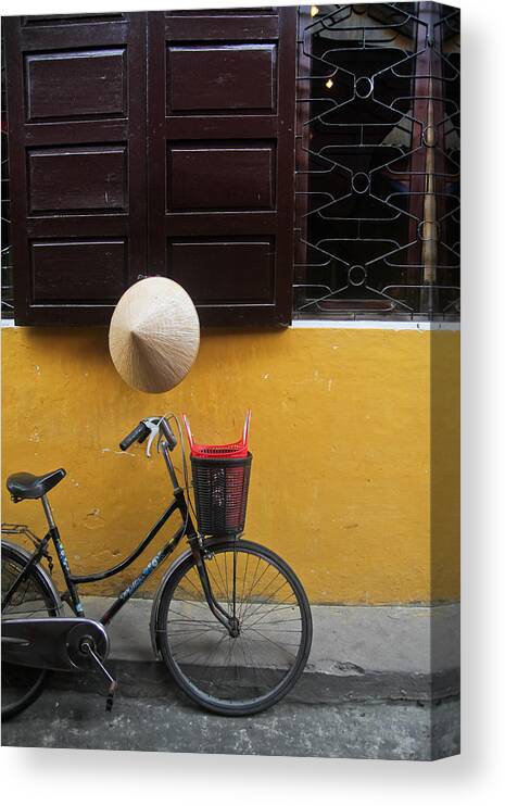 Shadow Canvas Print featuring the photograph Asian style conical hat in Vietnam by Vu Pham Van