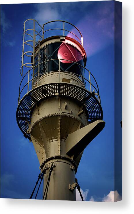 Lighthouse Canvas Print featuring the photograph Beam of light from a lighthouse. by Bernhard Schaffer