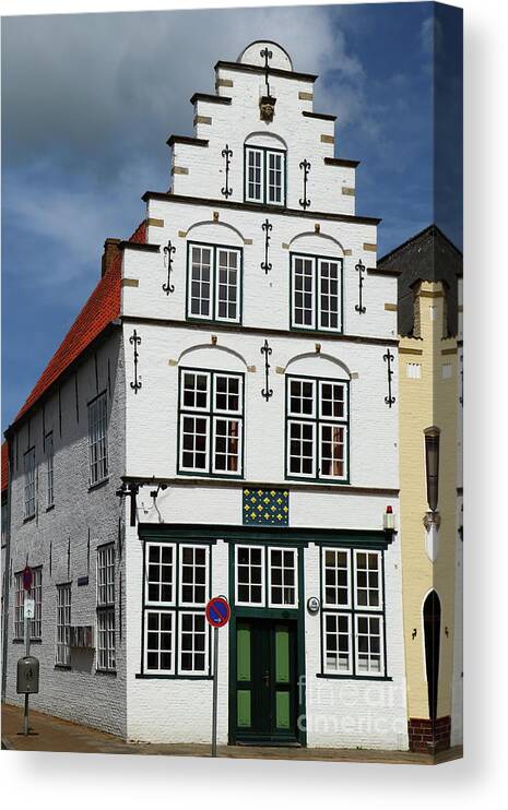 Town Canal Canvas Print featuring the photograph Beautiful Old Town House Friedrichstadt by Christiane Schulze Art And Photography