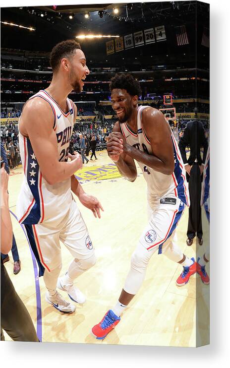Nba Pro Basketball Canvas Print featuring the photograph Ben Simmons and Joel Embiid by Andrew D. Bernstein