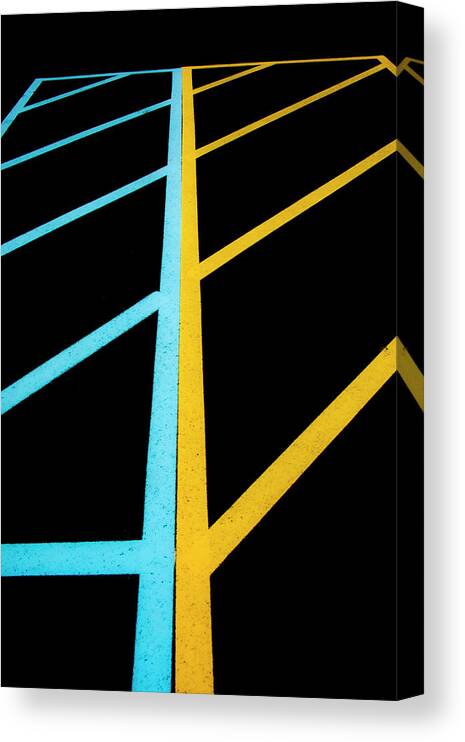 Traffic Lines Canvas Print featuring the photograph Blue And Yellow Traffic Lines Meet Along The Boarder by Gary Slawsky