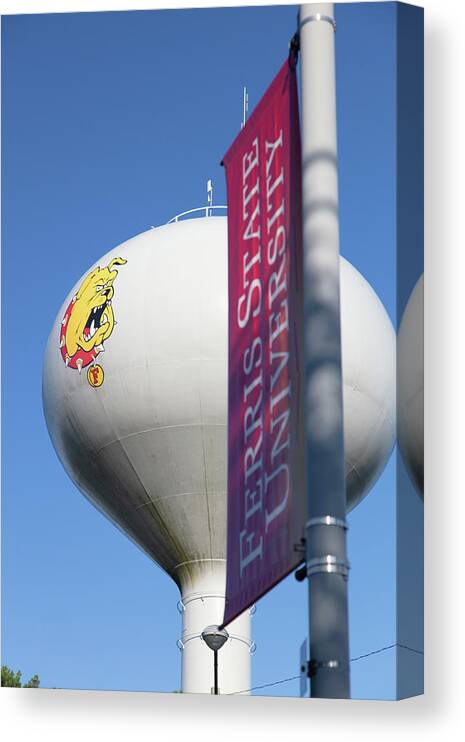 Ferris State Canvas Print featuring the photograph Ferris State University water tower and banner by Eldon McGraw