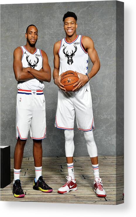 Nba Pro Basketball Canvas Print featuring the photograph Giannis Antetokounmpo and Khris Middleton by Jesse D. Garrabrant