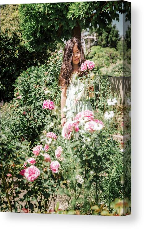 8 Years Old Canvas Print featuring the photograph Girl with roses by Benoit Bruchez