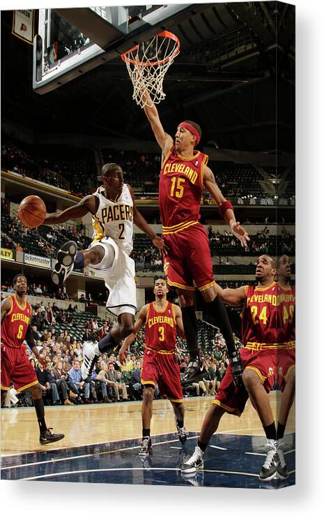 Nba Pro Basketball Canvas Print featuring the photograph Jamario Moon and Darren Collison by Ron Hoskins