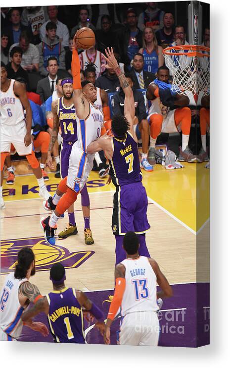 Nba Pro Basketball Canvas Print featuring the photograph Javale Mcgee and Russell Westbrook by Adam Pantozzi