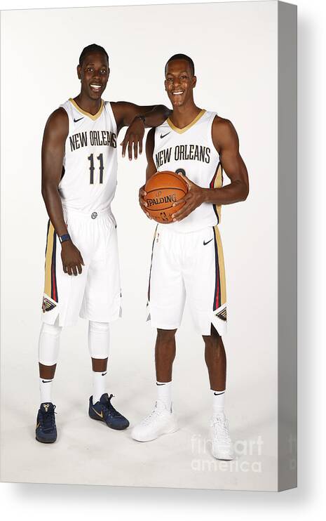 Media Day Canvas Print featuring the photograph Jrue Holiday and Rajon Rondo by Jonathan Bachman