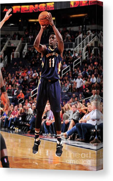 Nba Pro Basketball Canvas Print featuring the photograph Jrue Holiday by Barry Gossage