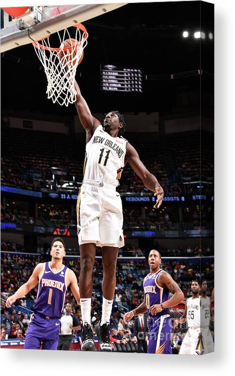 Smoothie King Center Canvas Print featuring the photograph Jrue Holiday by Bill Baptist