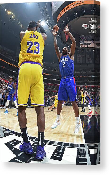 Nba Pro Basketball Canvas Print featuring the photograph Kawhi Leonard and Lebron James by Andrew D. Bernstein