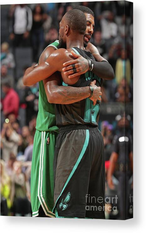 Kemba Walker Canvas Print featuring the photograph Kemba Walker and Kyrie Irving by Kent Smith