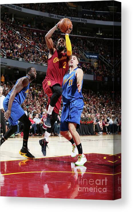 Nba Pro Basketball Canvas Print featuring the photograph Kyrie Irving and Klay Thompson by David Sherman