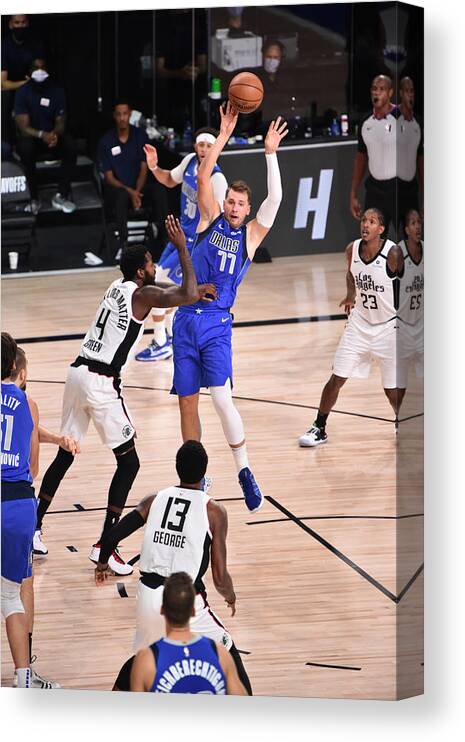 Playoffs Canvas Print featuring the photograph LA Clippers v Dallas Mavericks - Game Three by David Dow