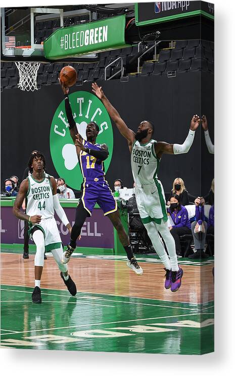 Dennis Schroder Canvas Print featuring the photograph Los Angeles Lakers v Boston Celtics by Brian Babineau