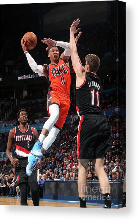 Meyers Leonard Canvas Print featuring the photograph Meyers Leonard and Russell Westbrook by Layne Murdoch
