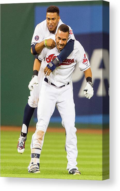 People Canvas Print featuring the photograph Michael Brantley and Francisco Lindor by Jason Miller