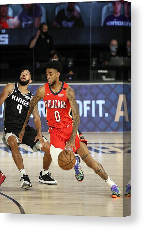 Nba Pro Basketball Canvas Print featuring the photograph New Orleans Pelicans v Sacramento Kings by Joe Murphy