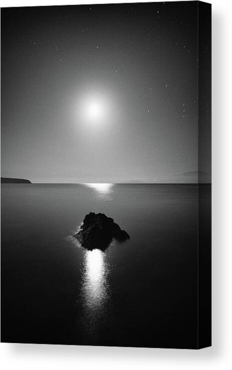 Black And White Canvas Print featuring the photograph Night on earth 1 by George Vlachos