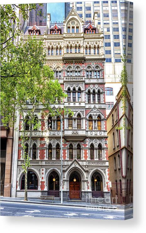 Gothic Revival Canvas Print featuring the photograph Ornate exterior of the Melbourne Safe Deposit building, designed by architect and politician, William Pitt and built in the Gothic Revival style in 1890. by Jane Rix