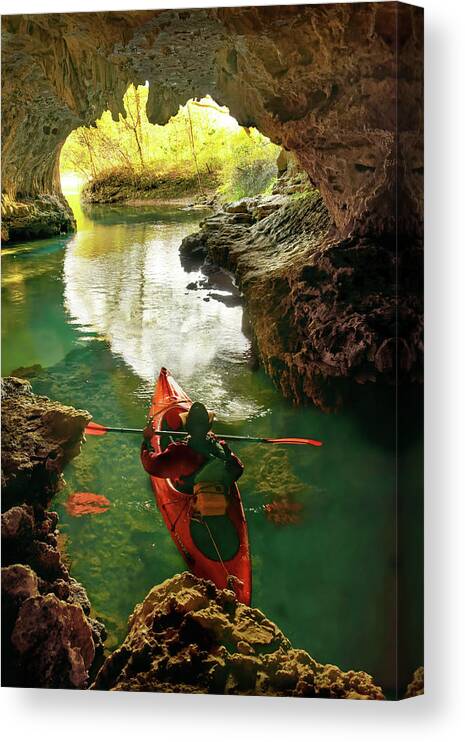 Kayak Canvas Print featuring the photograph paddling in Cave Spring by Robert Charity