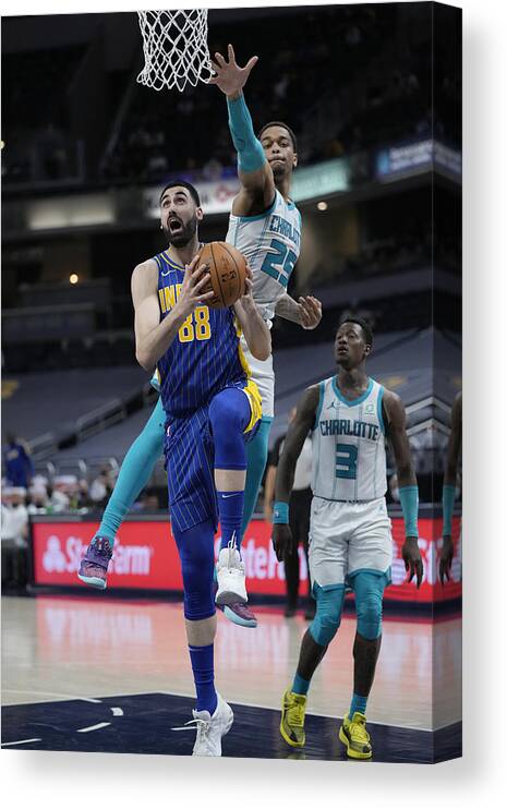 Nba Pro Basketball Canvas Print featuring the photograph Play-In Tournament - Charlotte Hornets v Indiana Pacers by A.J. Mast
