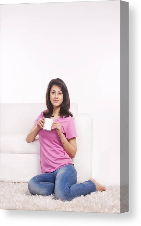 Rug Canvas Print featuring the photograph Portrait of a woman with a mug of tea by Sudipta Halder