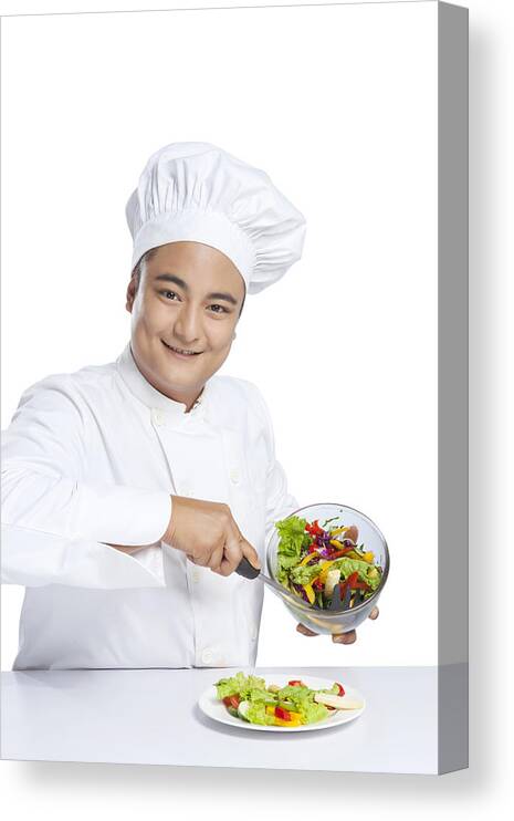 Young Men Canvas Print featuring the photograph Portrait of chef serving vegetables on plate by Ravi Ranjan