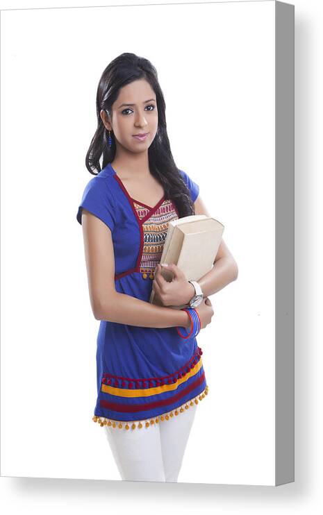 Three Quarter Length Canvas Print featuring the photograph Portrait of college girl with book by IndiaPix/IndiaPicture