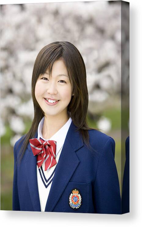 Education Canvas Print featuring the photograph Portrait of high school girl with cherry blossoms in the background by Daj