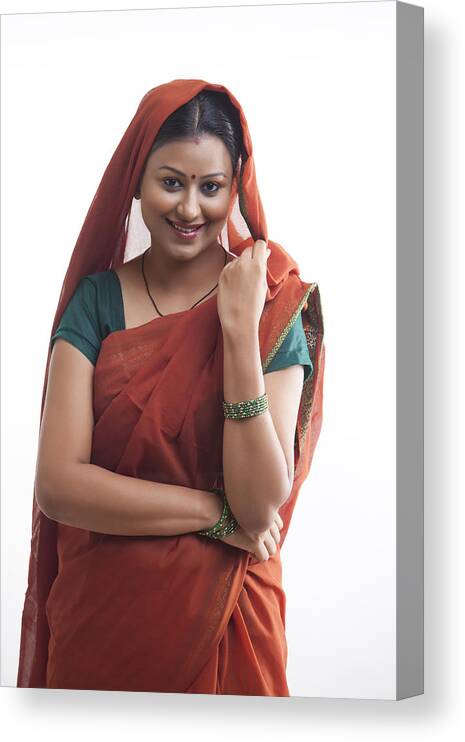 Three Quarter Length Canvas Print featuring the photograph Portrait of rural woman smiling by Hemant Mehta