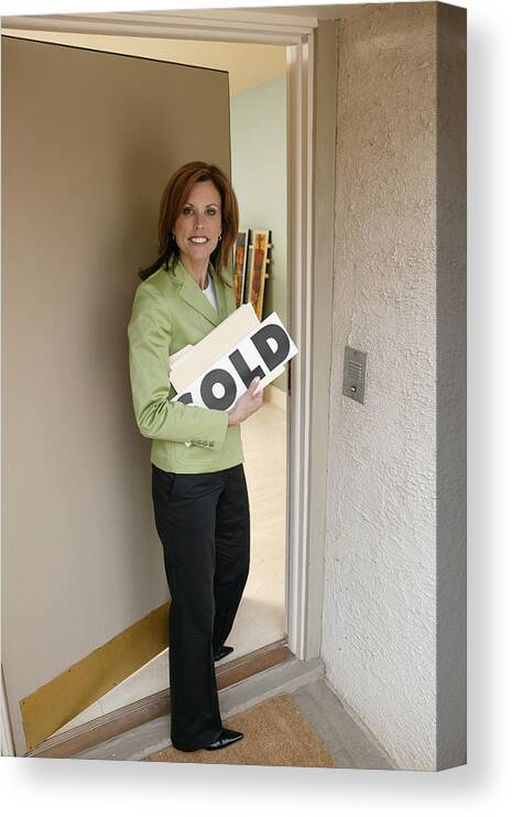 Mid Adult Women Canvas Print featuring the photograph Realtor opening door by Comstock Images
