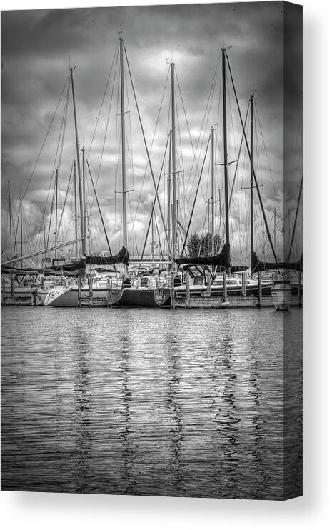 Boats Canvas Print featuring the photograph Reflections and Boats at the Harbor in Black and White by Debra and Dave Vanderlaan