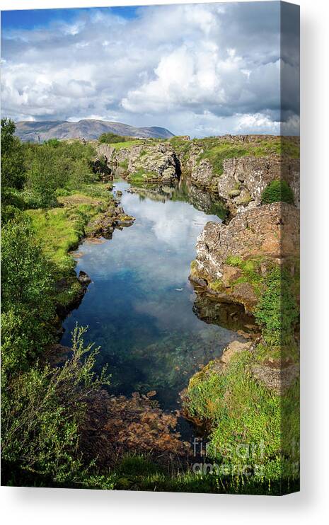 Iceland Canvas Print featuring the photograph Reflections in Thingvellir, Iceland by Delphimages Photo Creations