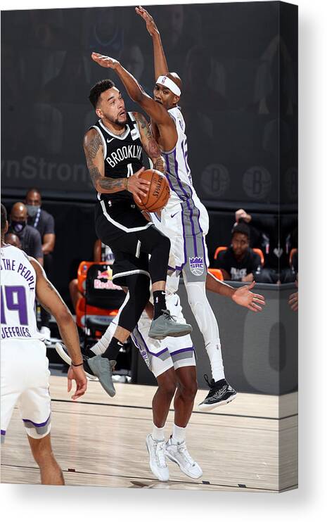 Chris Chiozza Canvas Print featuring the photograph Sacramento Kings v Brooklyn Nets by David Sherman