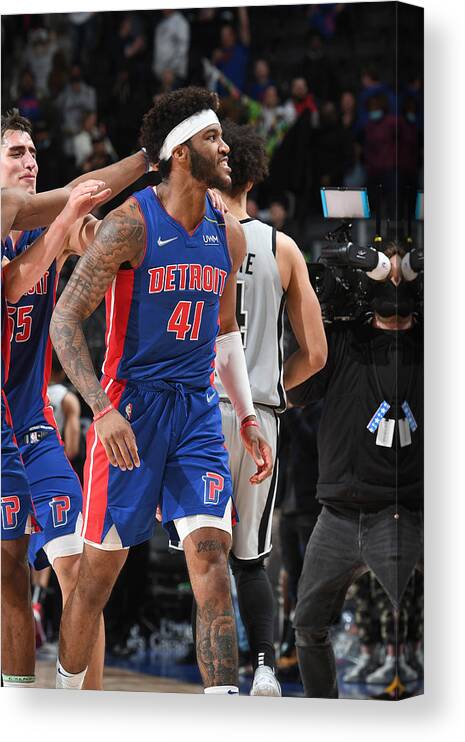 Saddiq Bey Canvas Print featuring the photograph San Antonio Spurs v Detroit Pistons by Chris Schwegler