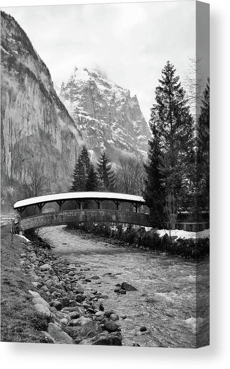 Covered Bridge Canvas Print featuring the photograph Snow Covered Footbridge in Jungfrau Village of Lauterbrunnen Switzerland Black and White by Shawn O'Brien