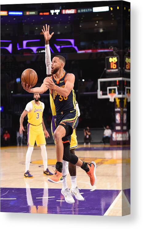 Nba Pro Basketball Canvas Print featuring the photograph Stephen Curry by Juan Ocampo
