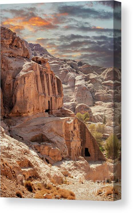 Petra Canvas Print featuring the photograph Sunset at the lost city of Petra, Jordan. Amazing buildings are carved out of the pink rock and the Rose City dates to around 300 BC by Jane Rix