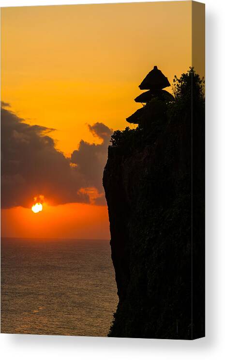 Scenics Canvas Print featuring the photograph Sunset at Uluwatu Bali Indonesia by Lightofchairat