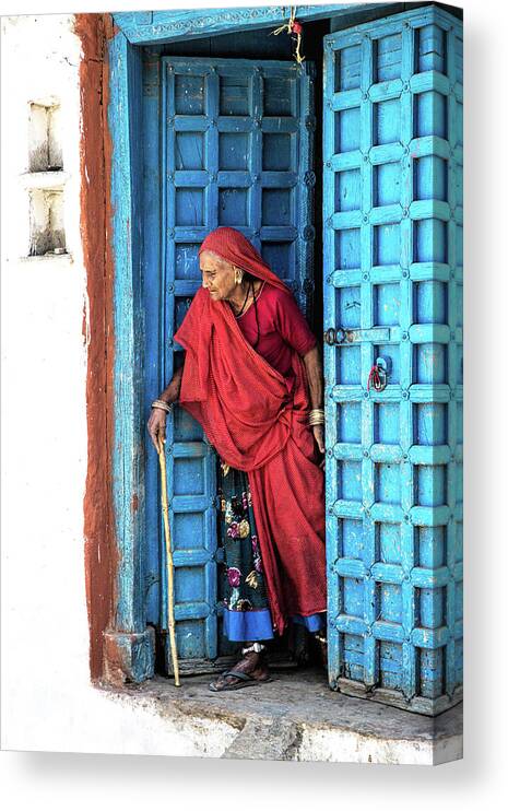India Canvas Print featuring the photograph The lady in red by Gaye Bentham